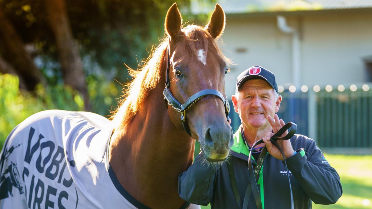 Trainer John Sadler and Starry Legend at their Caulfield stable. Photo: Jay Town