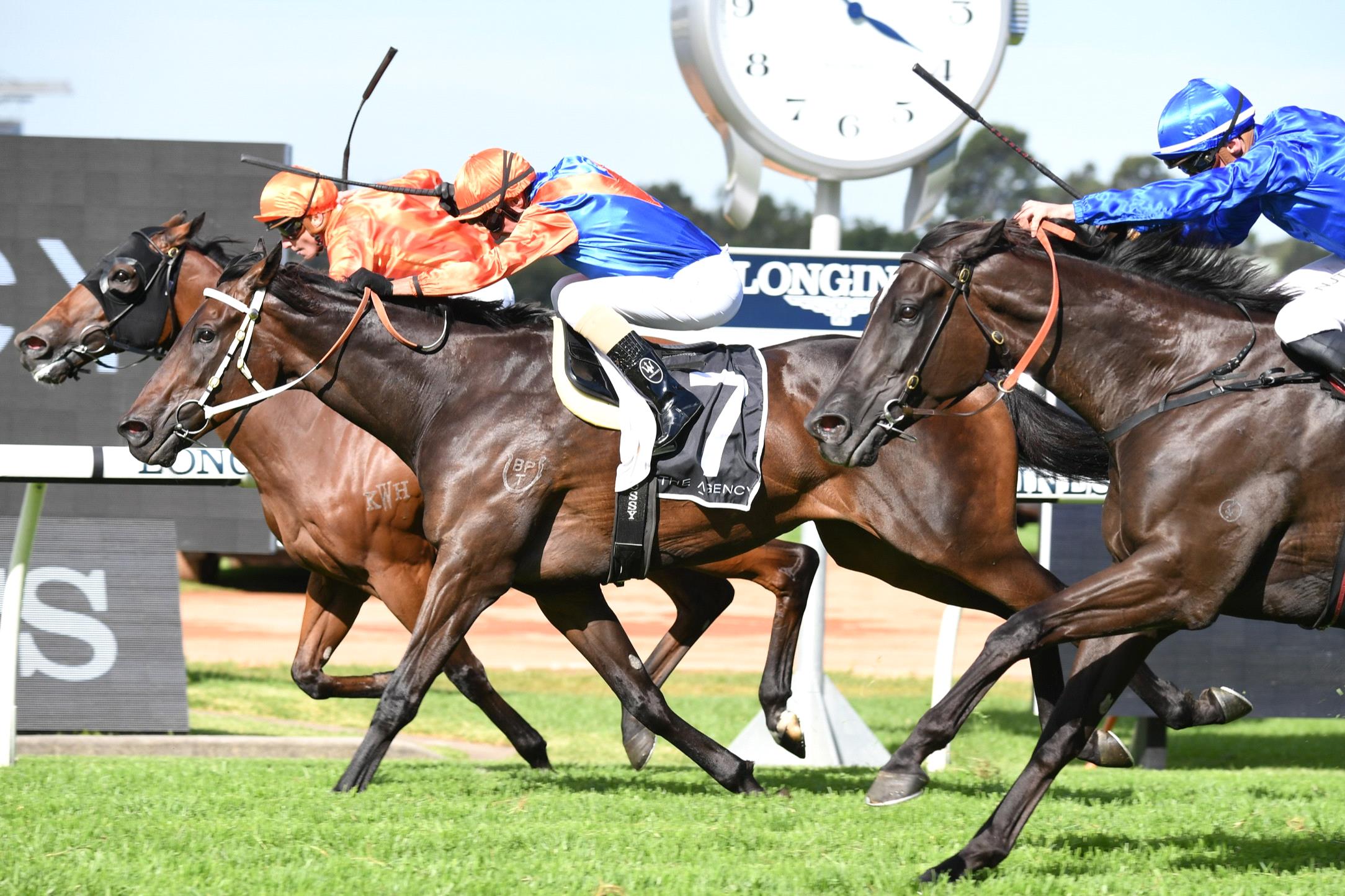 Think It Over (centre) edges out Dreamforce in the George Ryder Stakes.