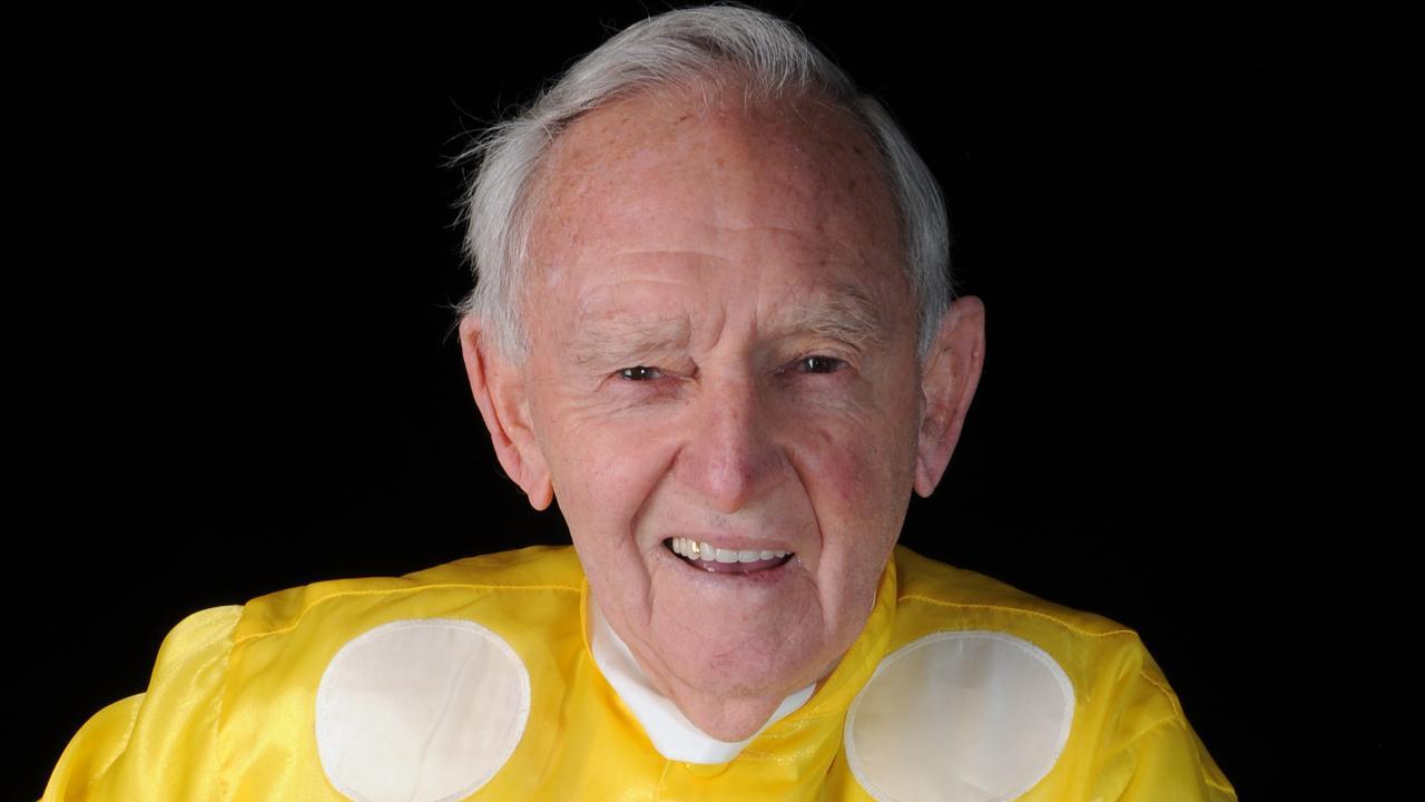 Triple Melbourne Cup-winning jockey Jim Johnson in the yellow and white silks he wore on Rain Lover in 1968 and 1969.