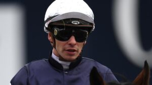 Ben Melham will don Lloyd Williams’ navy and white silks again on Buckhurst in Saturday’s Caulfield Cup. Photo: AAP Image/Julian Smith.