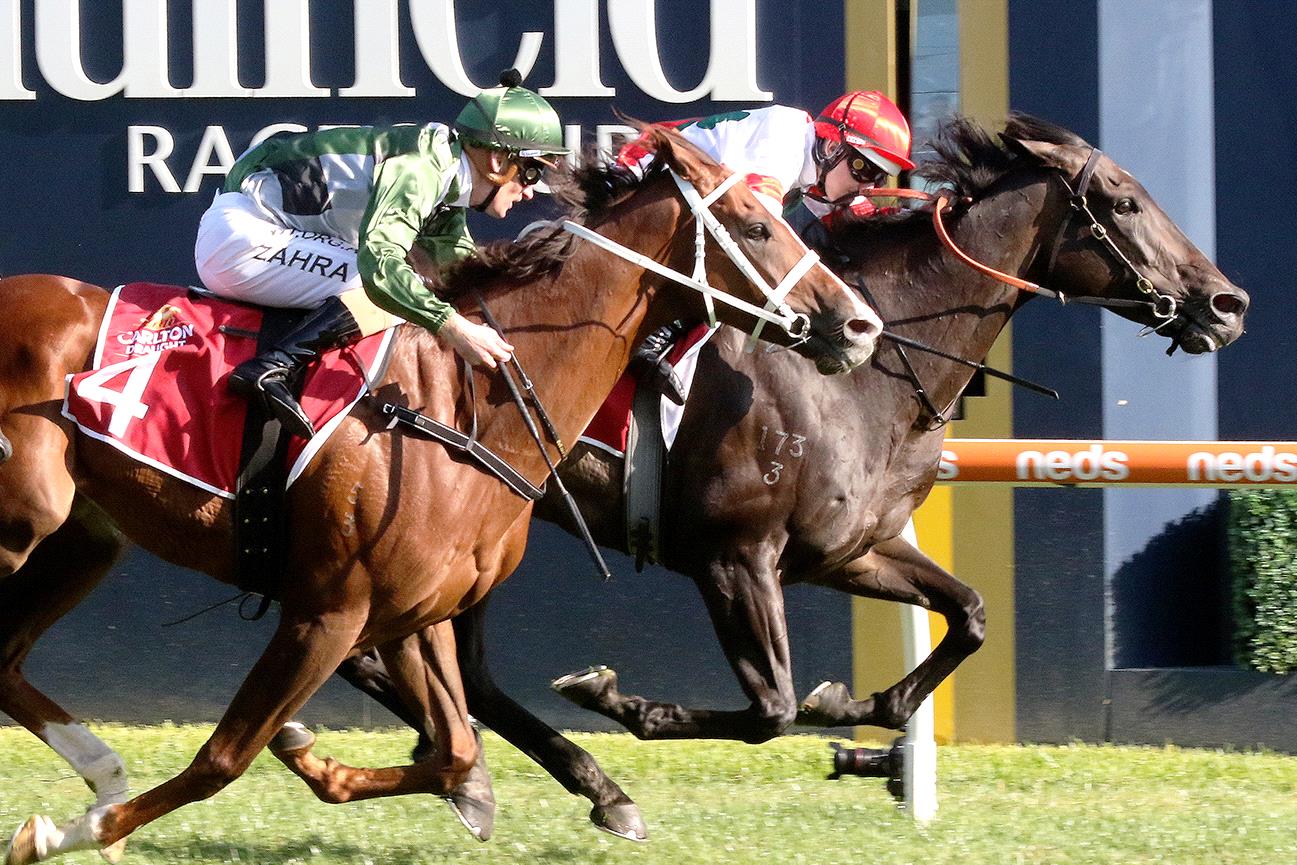 Miss Siska (red cap) held off King’s Will Dream to win the Peter Young Stakes at Caulfield.