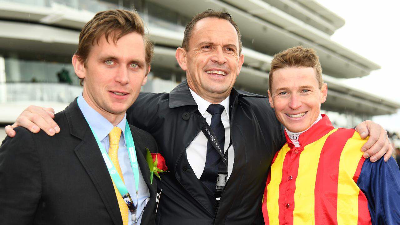 Charlie Duckworth with trainer Chris Waller and jockey James McDonald. Picture: AAP