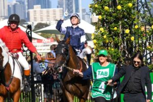 Jye McNeil pays his respects to the late Michael Gudinski after winning the Australian Cup on Homesman.