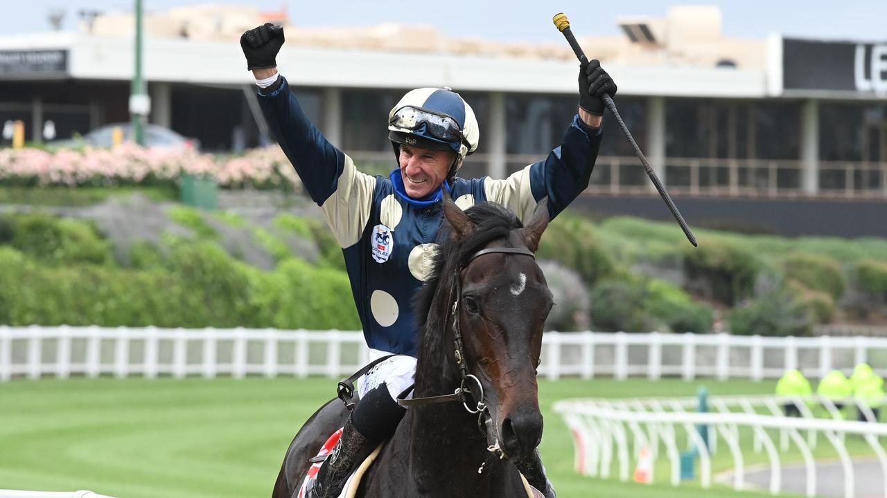 A triumphant Glen Boss returns to scale on Sir Dragonet after the Cox Plate win.