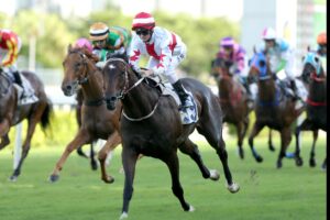 Zac Purton steered Awe to victory for trainer John Moore at Sha Tin on Sunday.