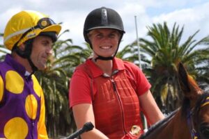 Sarah Cotton (right) in her guise as the clerk of the course. She’ll saddle Dark Wanderer at Launceston on Sunday.