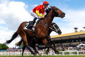 Tommy Berry winning the BRC Sires’ Produce Stakes on Strasbourg.