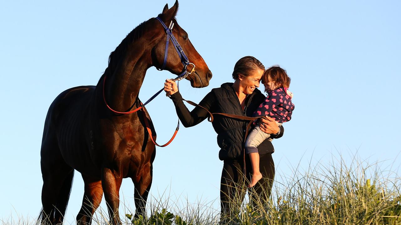 Kristen Buchanan with then two-year-old daughter MacKenzie and Sapphire Stakes winner Two Blue in 2016. Picture: Adam Head