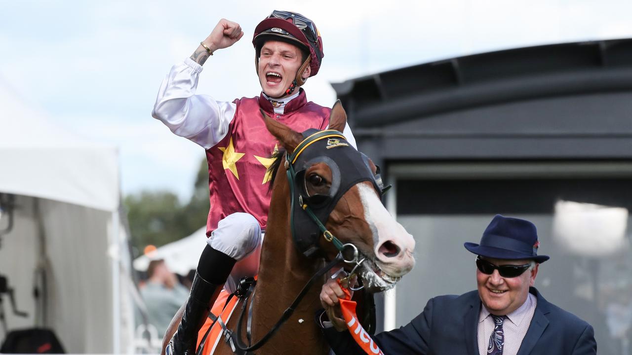 Zac Spain returns to the mounting yard aboard Streets of Avalon after winning the CF Orr Stakes. Picture: Racing Photos