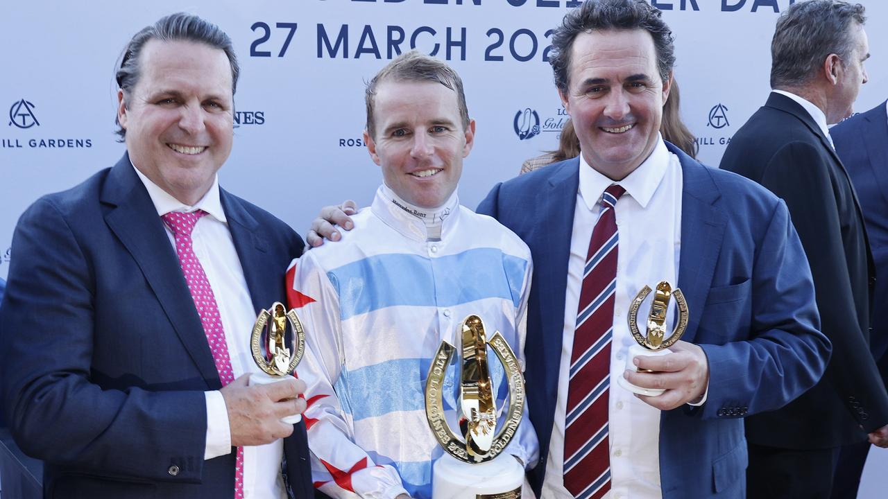 Richard and Michael Freedman pose with jockey Tommy Berry after winning the Golden Slipper this year. Picture: Mark Evans–Getty Images.