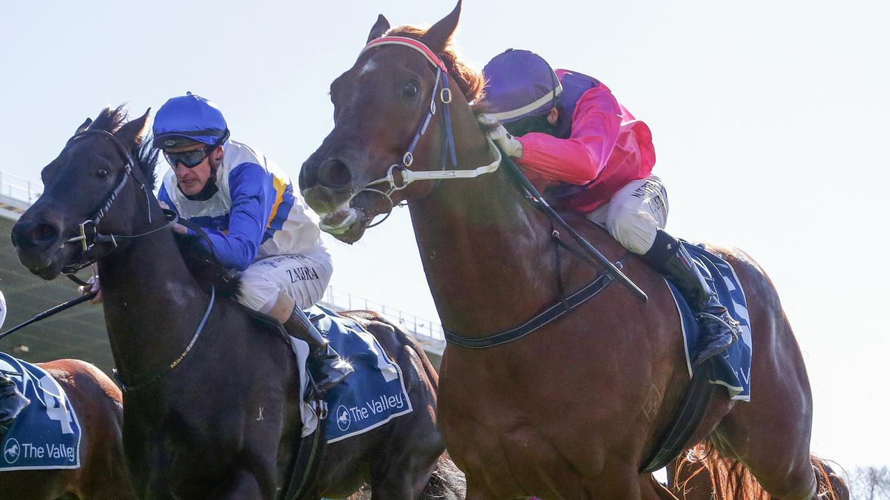 Rock Artist (right) holds on for victory at The Valley. Picture: Racing Photos via Getty Images