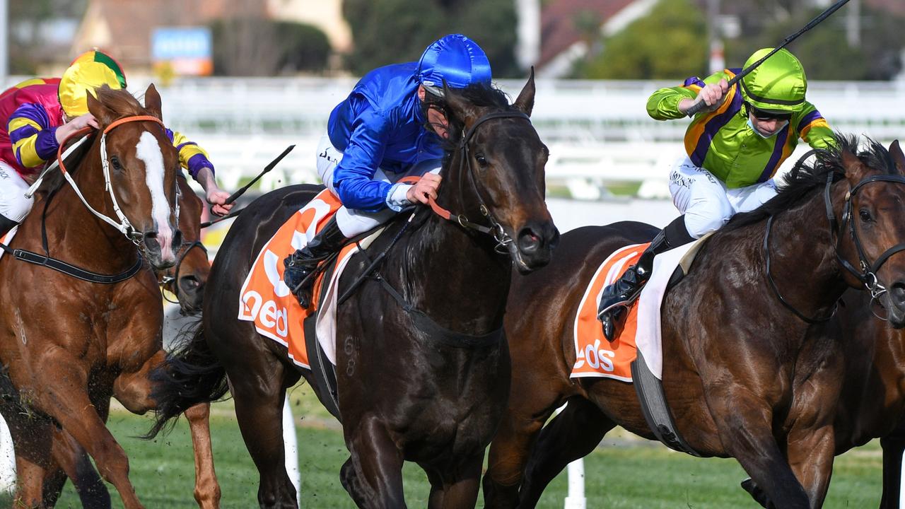 Damien Oliver powers Ingratiating to victory in the Vain Stakes. Picture: Getty Images