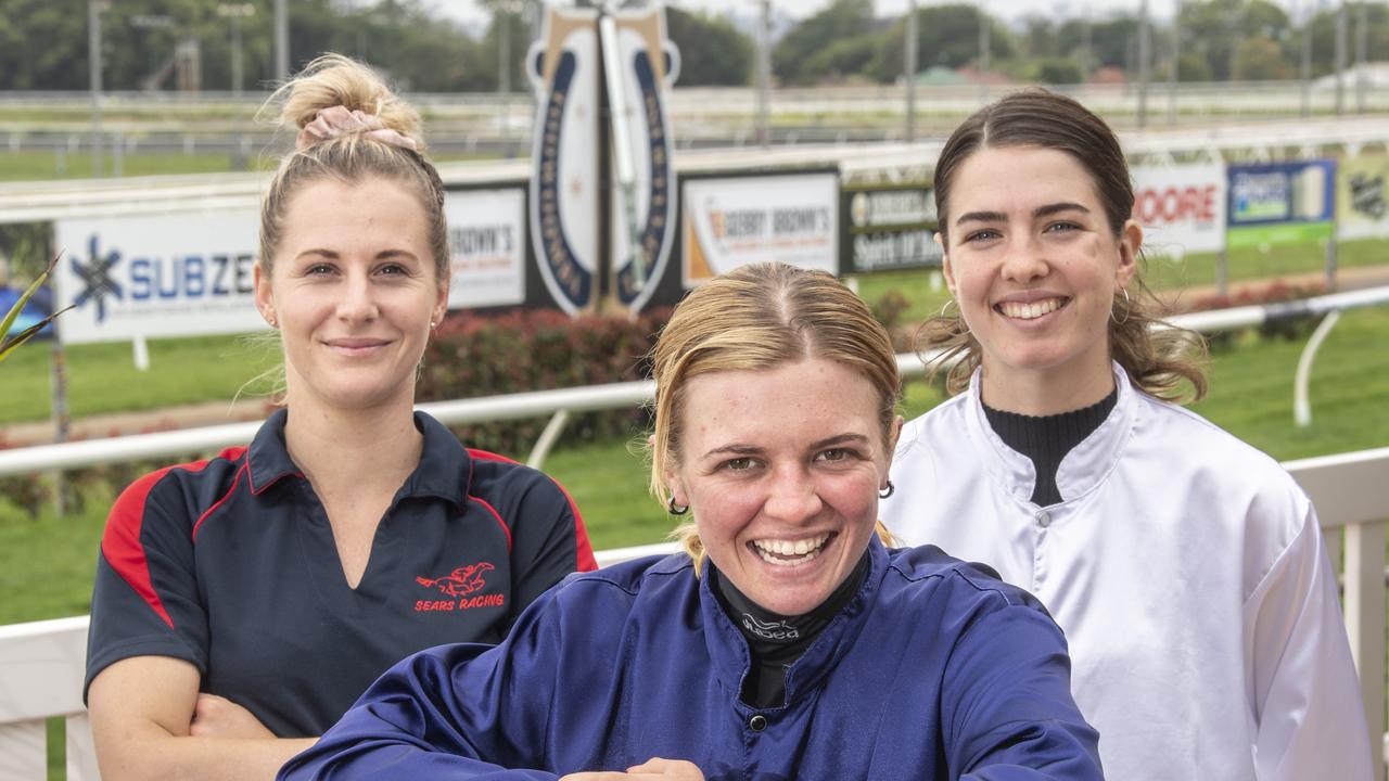 Jockeys ( from left) Bella Rabjones, Montanna Savva and Angela Jones at Toowoomba racecourse. Picture: Nev Madsen