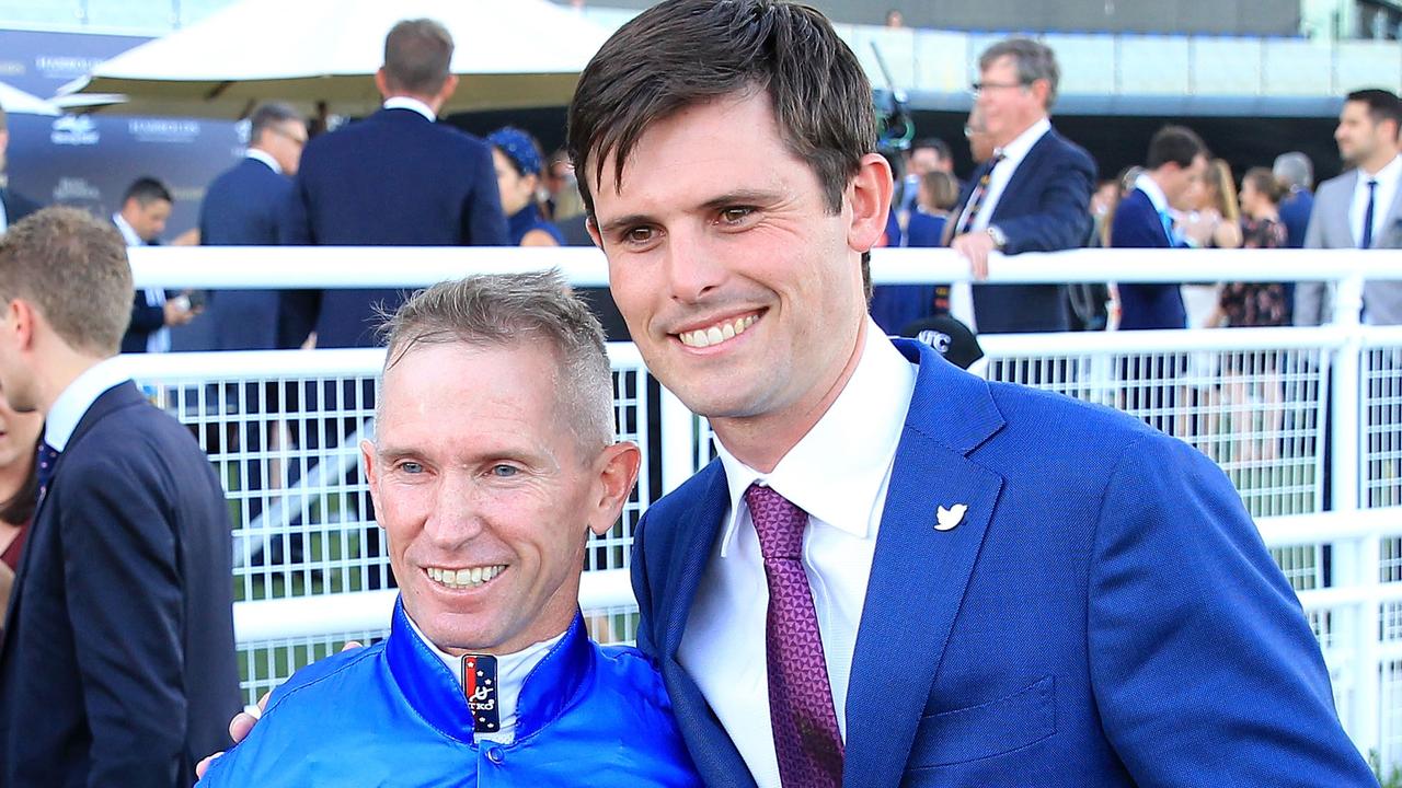 Glyn Schofield with James Cummings after combining to win a race. Picture: Getty Images