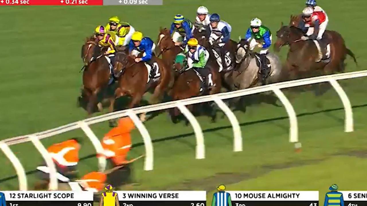 Caulfield track workers in close call during race