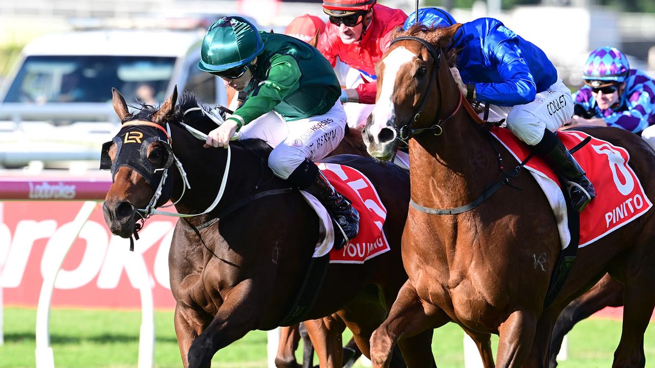 You Wahng (left) holds off Pinito to win the Group 1 Queensland Oaks at Eagle Farm. Picture: Trackside Photography